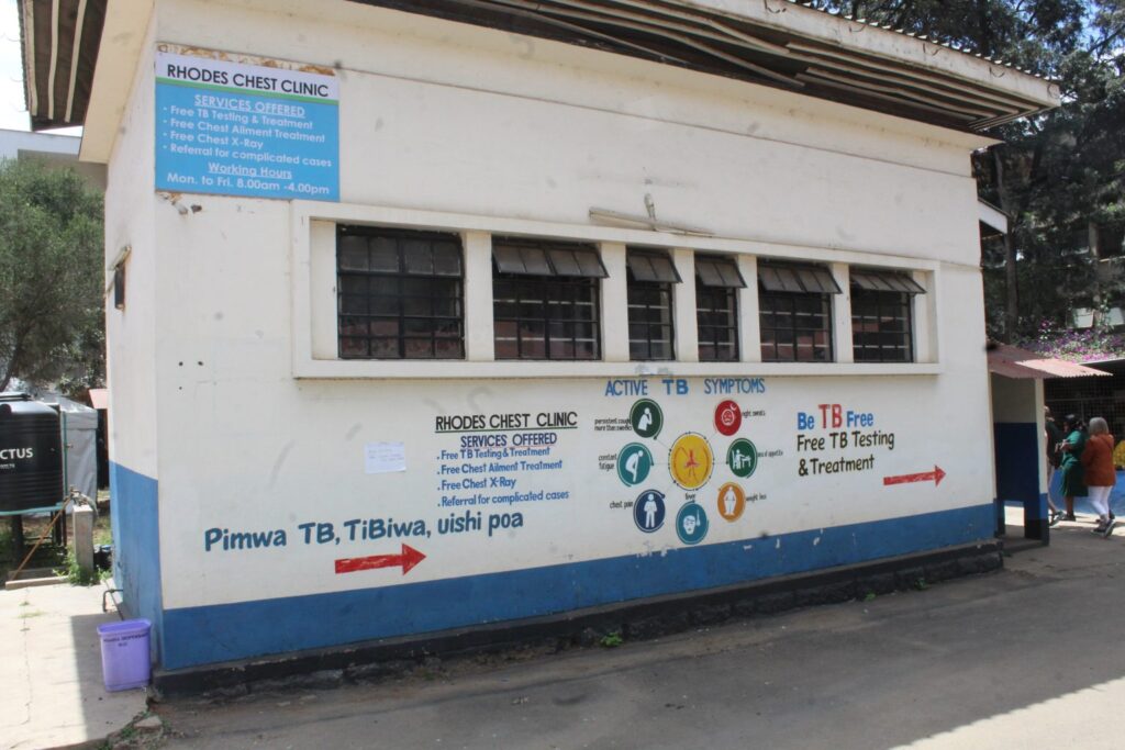 The exterior of the Rhodes Chest Clinic in Kenya displaying guidance around tuberculosis (TB). 